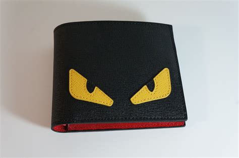 fendi monster eyes wallet|Fendi storm eye wallet.